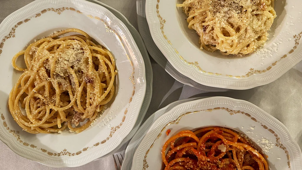 table of roman pastas Table showing three plates of Roman pasta