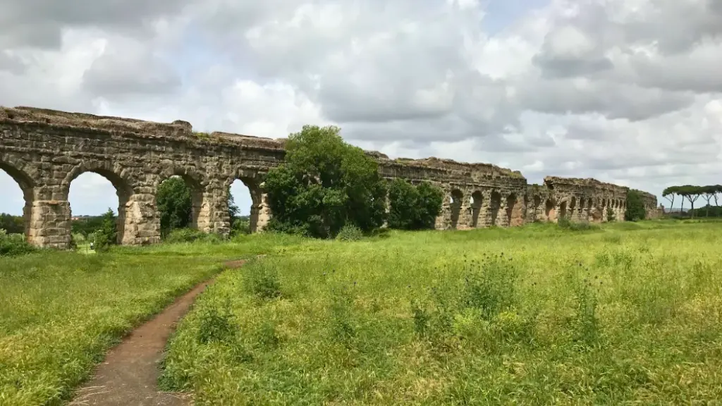 aqueduct ruins grass path