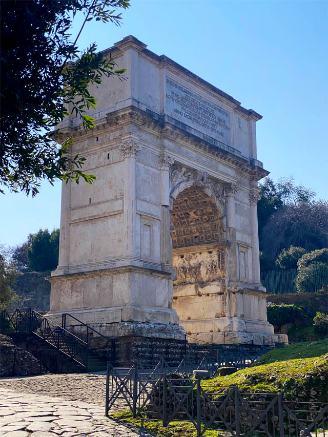 The Arch of Titus in the Roman Forum in Rome Italy The Arch of Titus in the Roman Forum in Rome Italy