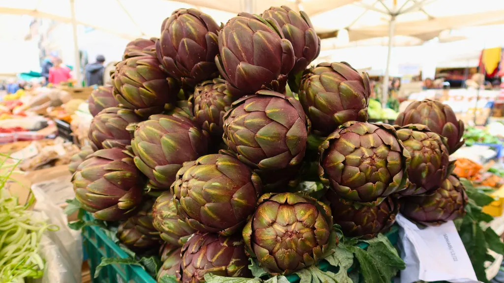 artichokes stacked market stall