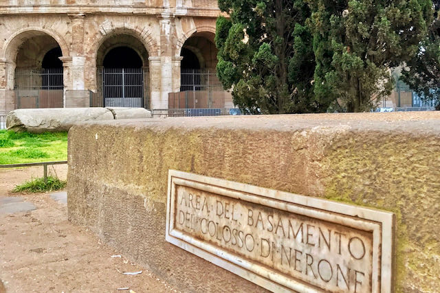 the base for nero's colossus is still intact and right next to the colosseum. the base for nero's colossus is still visible next to the colosseum