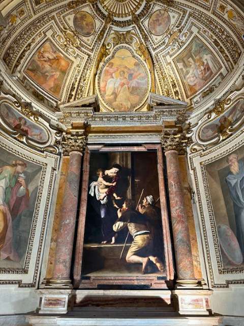 caravaggio madonna of loreto painting and chapel dome
