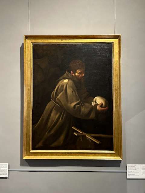 caravaggio st francis in prayer painting