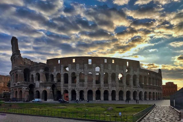 western end of colosseum at sunrise western end of colosseum at sunrise