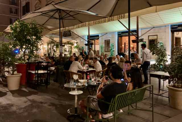 people sitting outside gusto