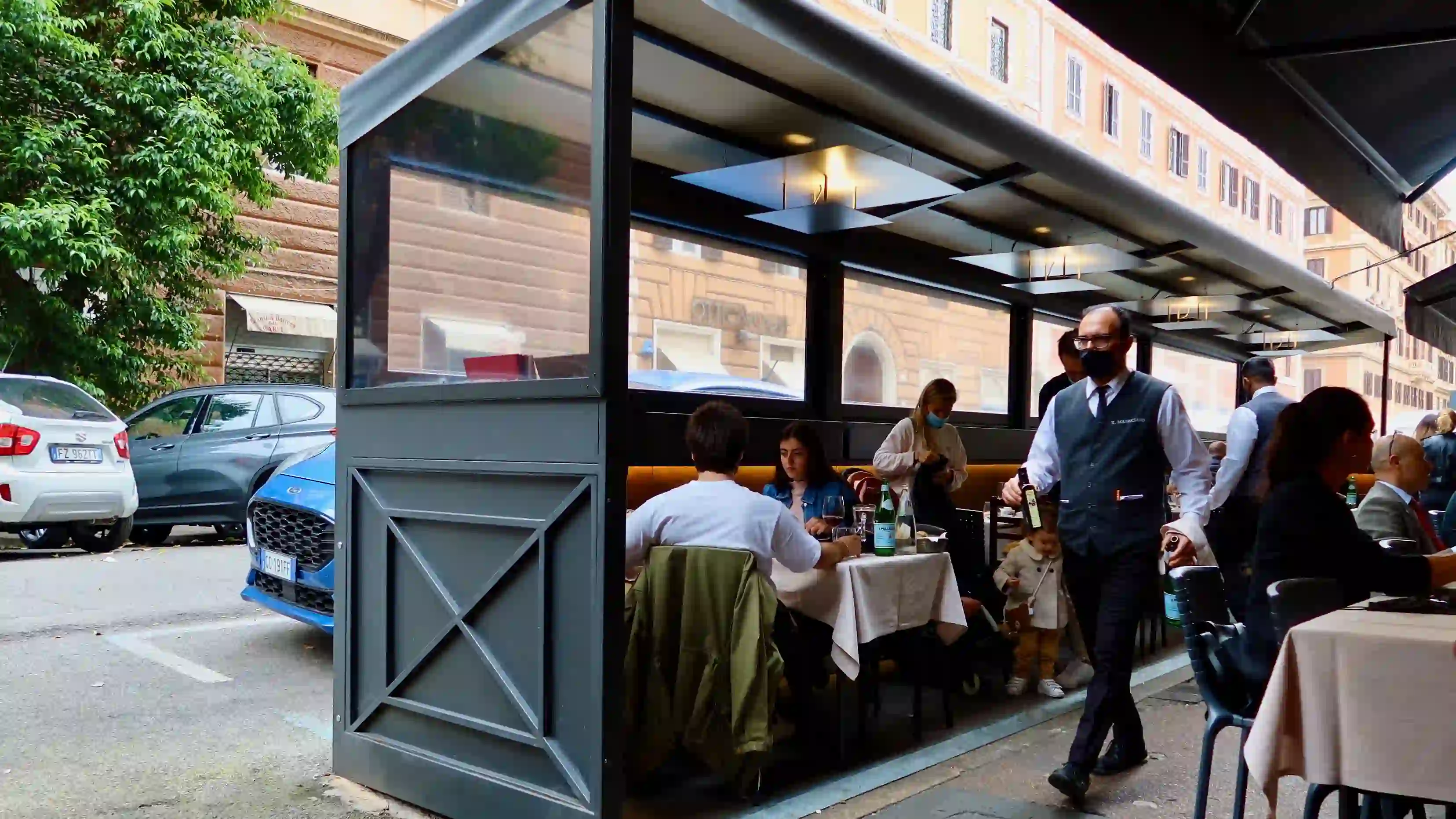 outdoor dining at il matriciano il matriciano - waiters and people