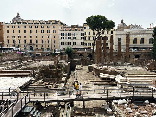 view of largo di torre argentina temples b and c with walkway view of largo di torre argentina temples b and c with walkway