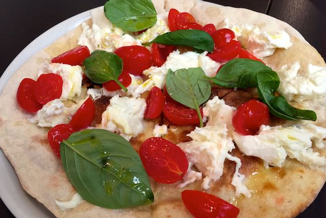 focaccia with mozzarella and fresh tomatoes and basil