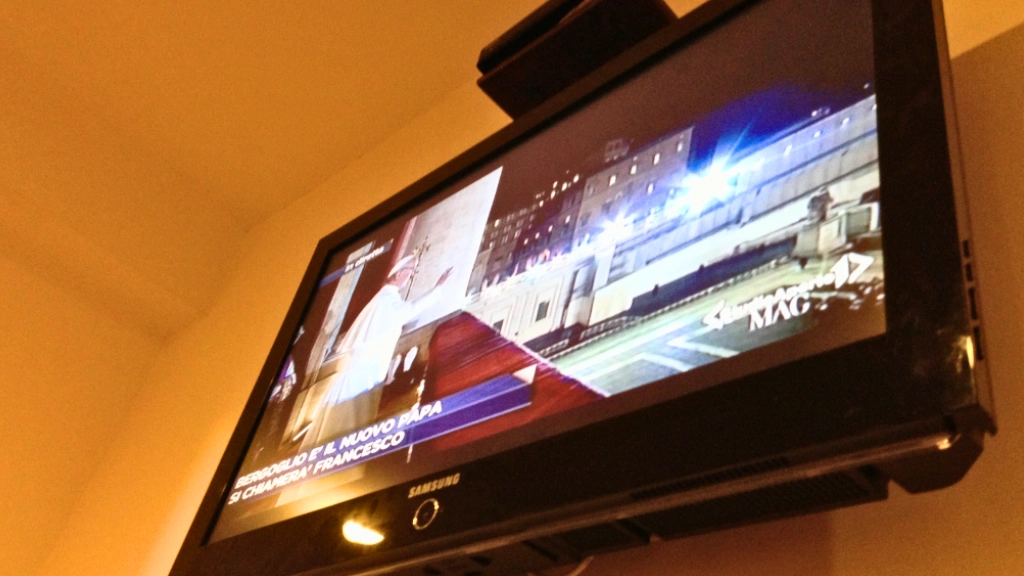 pope francis on night of election on tv screen