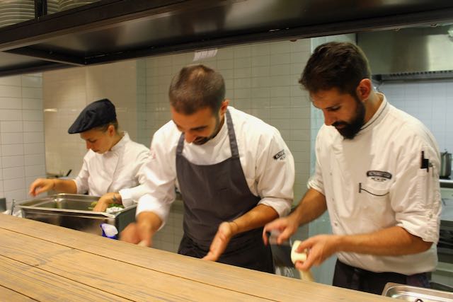 chefs in open kitchen at retrobottega chefs in open kitchen at retrobottega