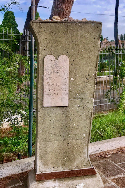 Jewish headstone with little stones on the top