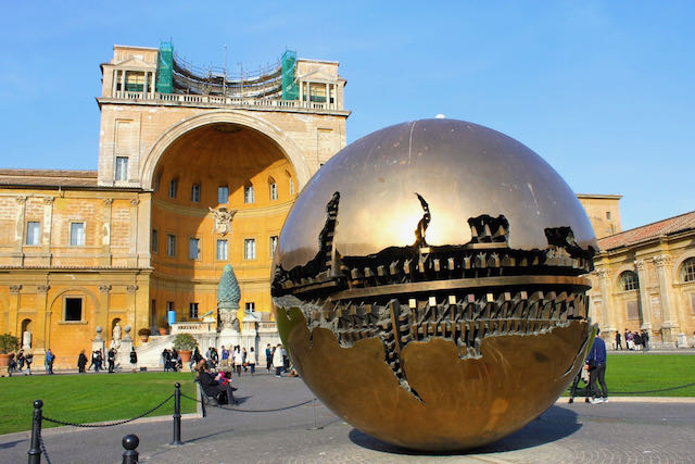 pinecone courtyard and sphere by Arnaldo Pomodoro