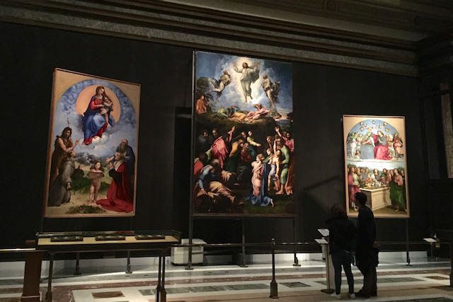 Raphael's Transfiguration flanked by two other of his paintings