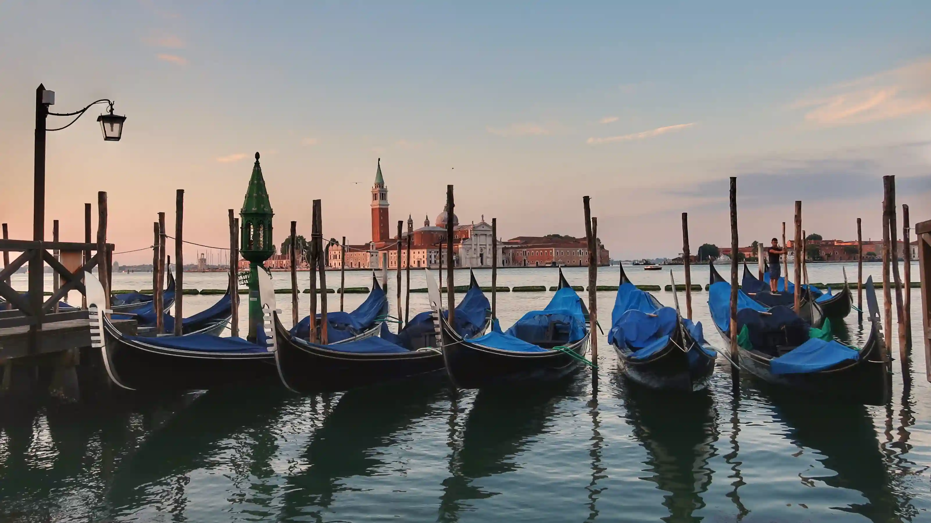 venice gondolas at sunset