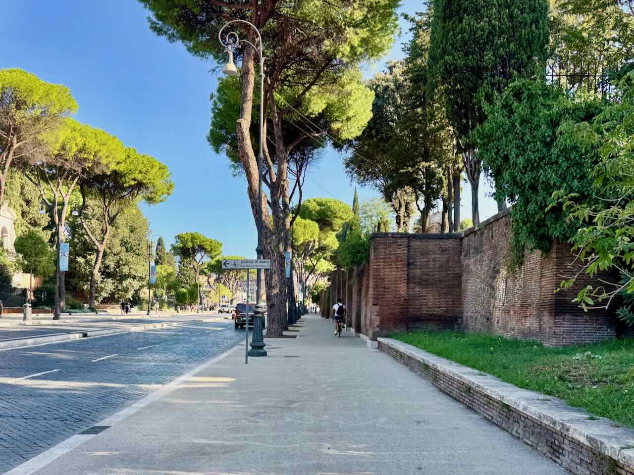 road near colosseum wide sidewalks