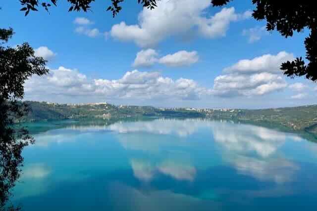 view of the apostolic palace in Castel Gandolfo from the opposite side of lake Albano