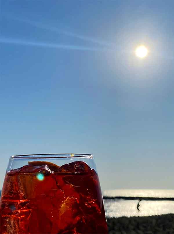 close up of spritz glass at the beach